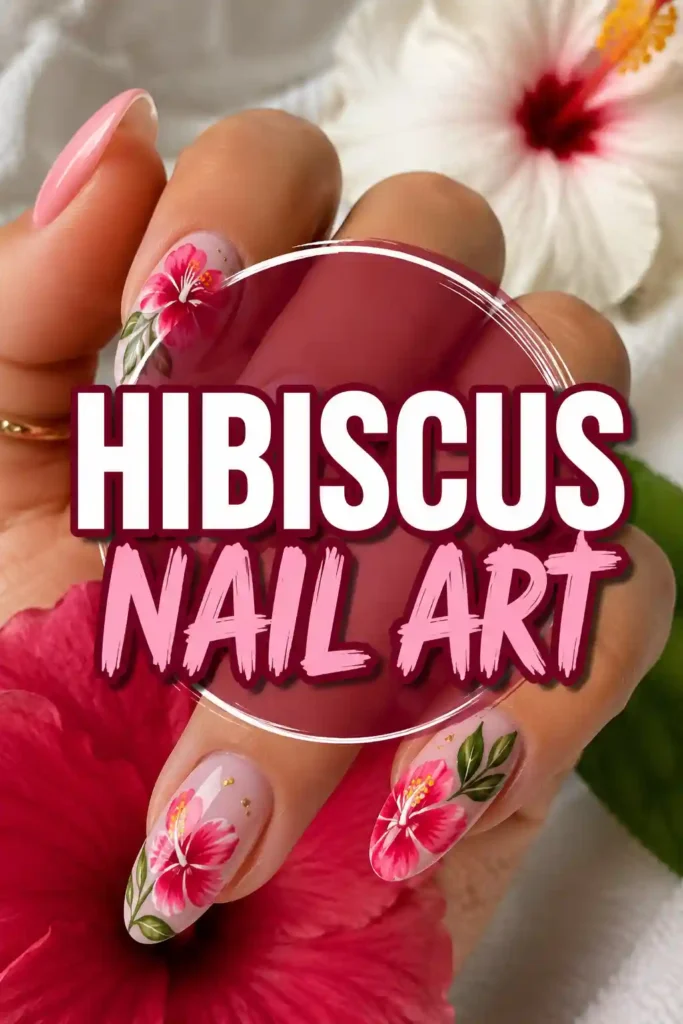 A hand with long nails decorated with pink hibiscus flower nail art. The background shows real hibiscus flowers. Text on the image reads, Hibiscus Nail Art..